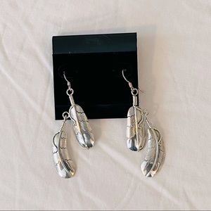 Handmade Native American, sterling silver feather earrings.